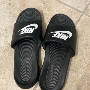 Nike Black Slide Sandals with White Swoosh Detail